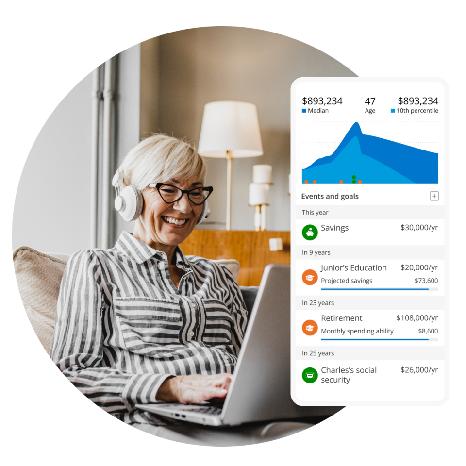 A smiling woman using a laptop, analyzing her financial data on a detailed dashboard interface.